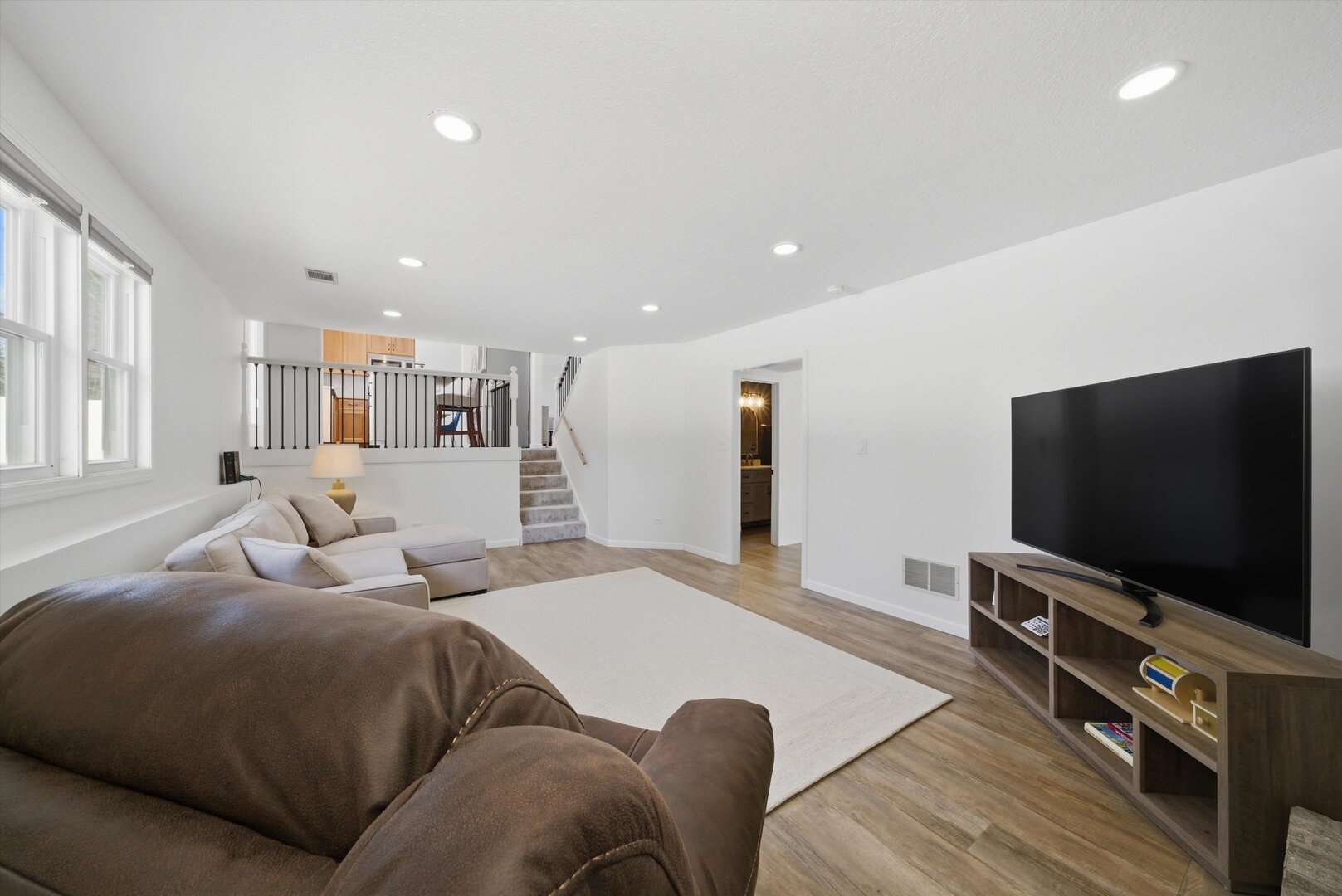 24350 Marble Road Channahon, IL 60410 - Photo 11 of 28 a living room with furniture and a flat screen tv