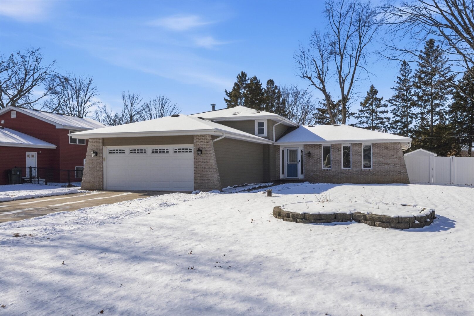 24350 Marble Road Channahon, IL 60410 - Photo 2 of 28 a front view of a house with a yard and garage