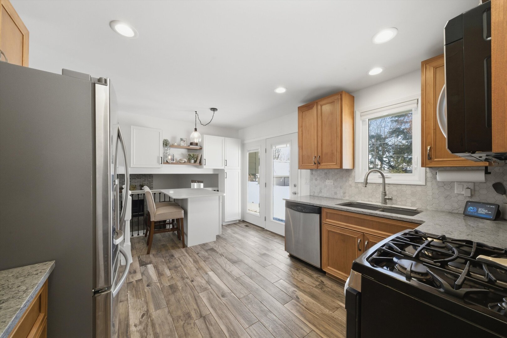 24350 Marble Road Channahon, IL 60410 - Photo 7 of 28 a kitchen with a sink stove and refrigerator