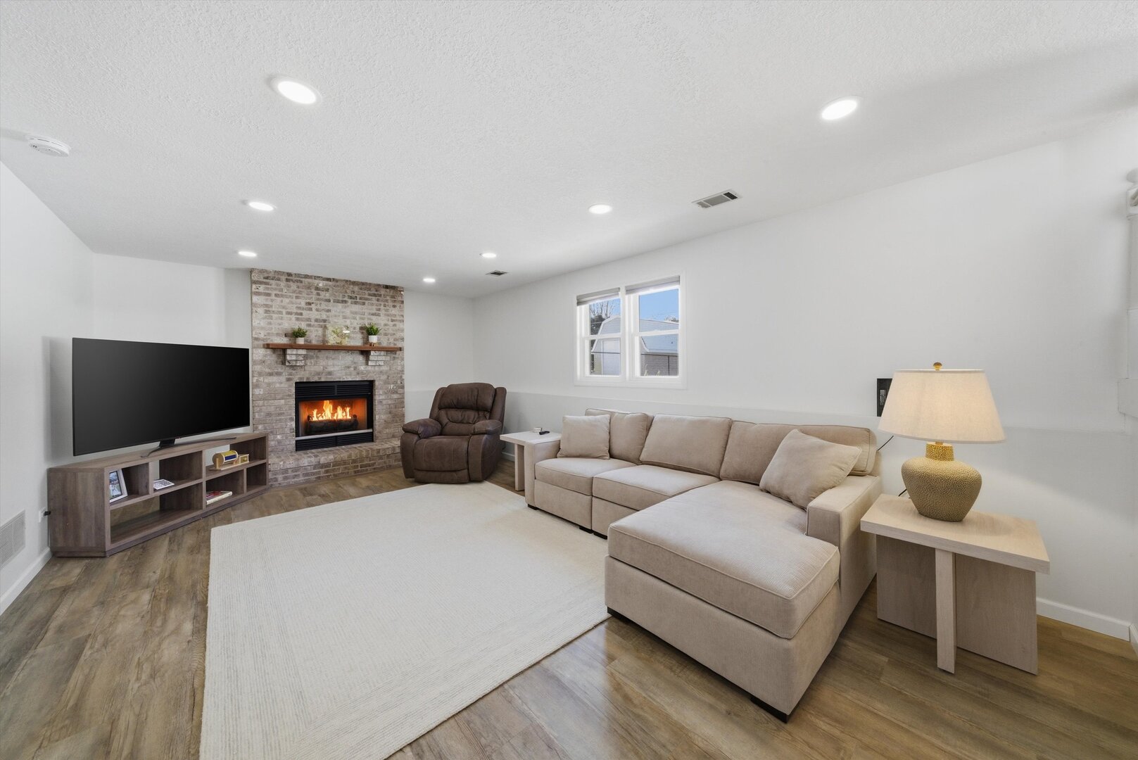 24350 Marble Road Channahon, IL 60410 - Photo 10 of 28 a living room with furniture and a flat screen tv
