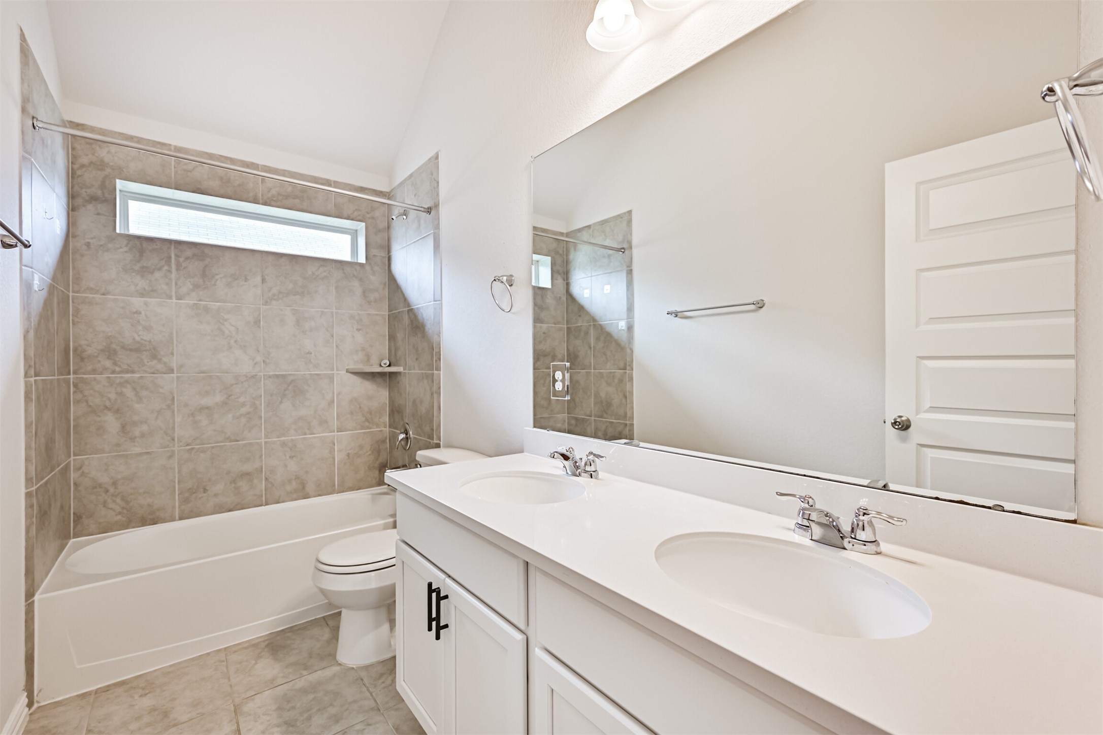 7019 Terra Drive Manvel, TX 77578 - Photo 28 of 41 a bathroom with a bathtub shower sink mirror vanity and toilet