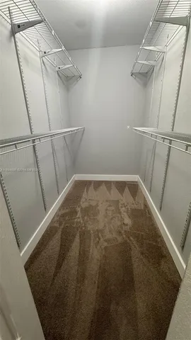 a view of a bathroom from a hallway