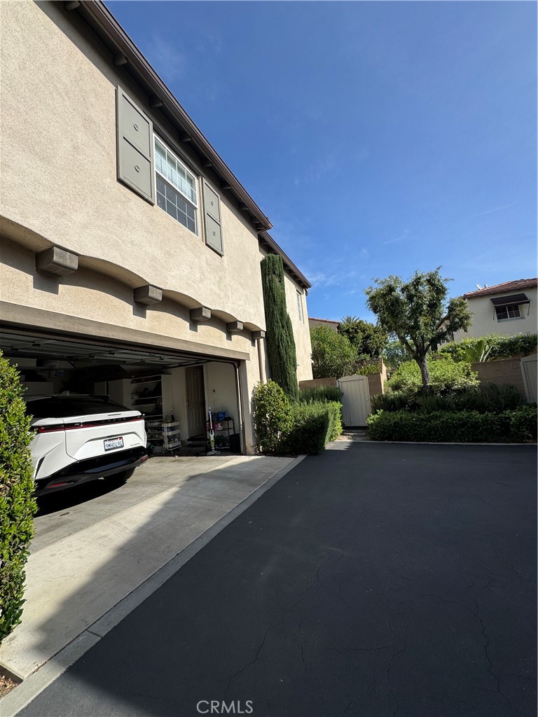 41 Modesto Irvine, CA 92602 - Photo 12 of 20 a view of a street with some cars parked in front of it