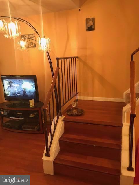 3424 Bruton Parish Way, Unit 25169 Silver Spring, MD 20904 - Photo 3 of 7 a view of entryway and hall with wooden floor