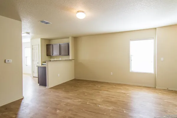 a view of a kitchen with a sink