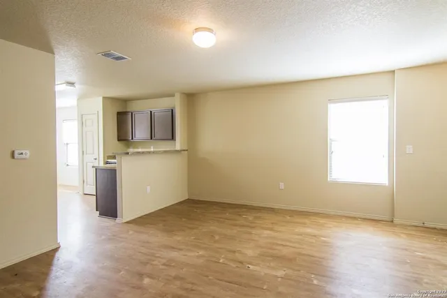 a view of a kitchen with a sink