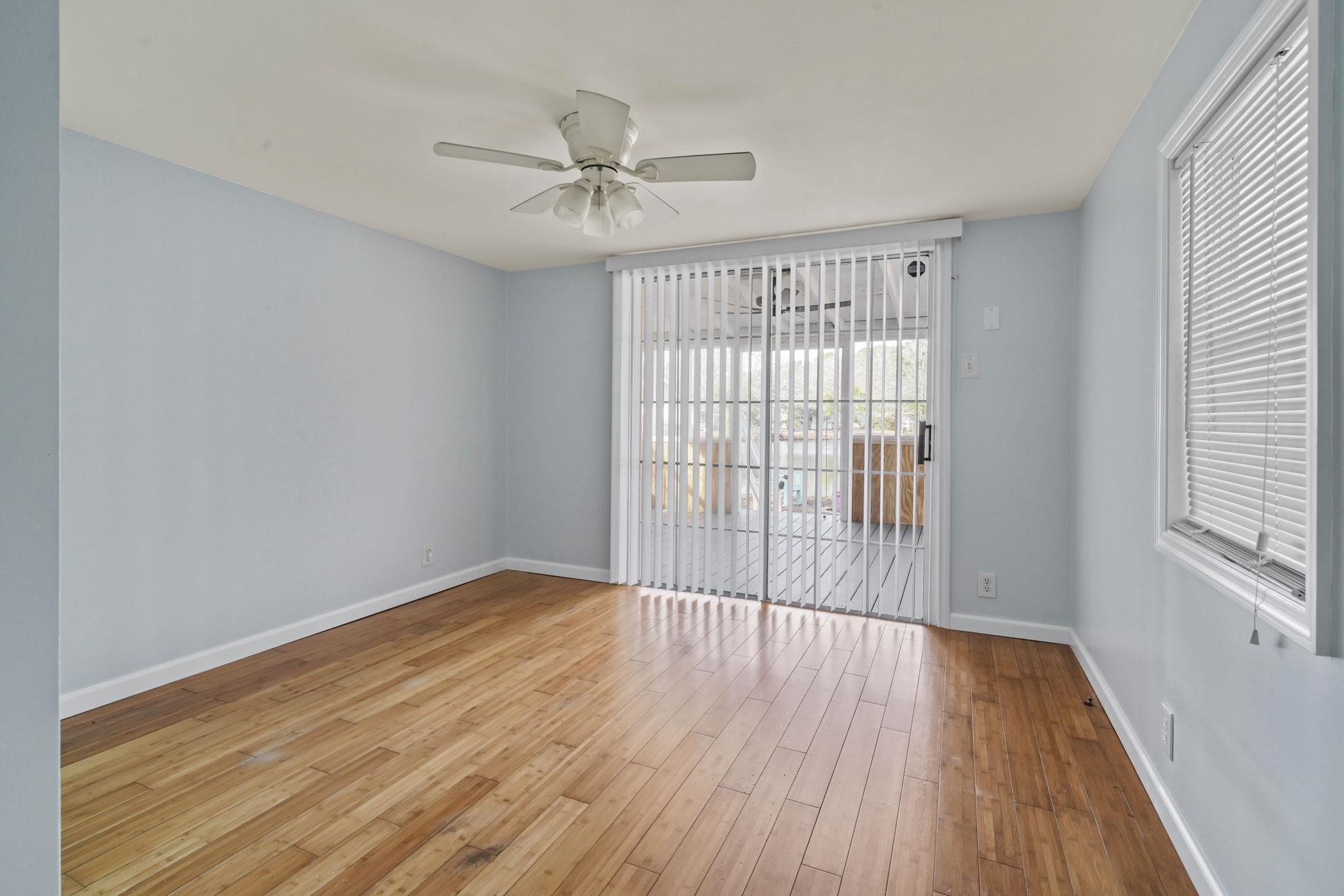 45 Shamrock Circle Murrells Inlet, SC 29576 - Photo 29 of 32 Unfurnished room featuring light wood-type flooring and a ceiling fan