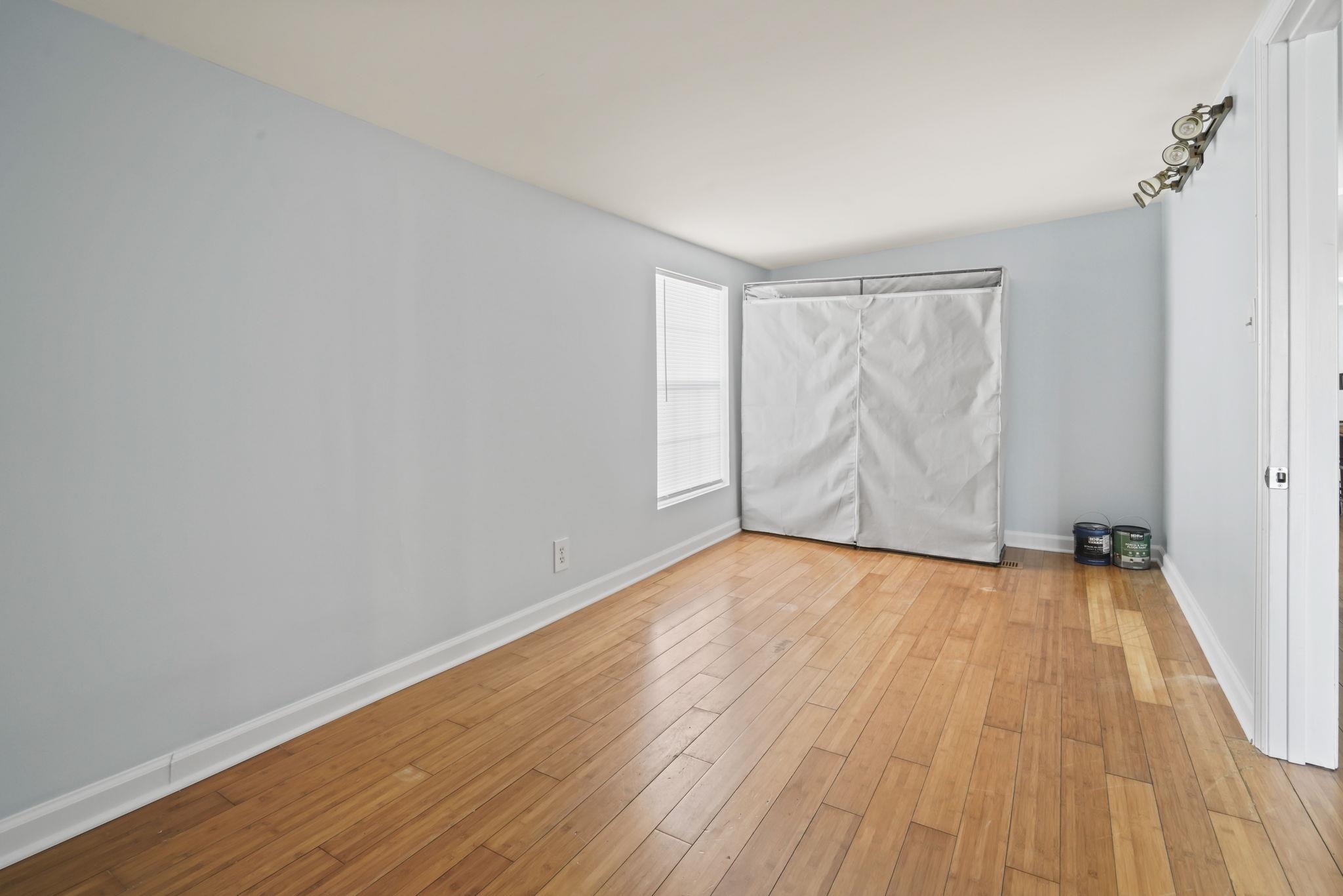45 Shamrock Circle Murrells Inlet, SC 29576 - Photo 32 of 32 Unfurnished bedroom with light wood-type flooring and vaulted ceiling