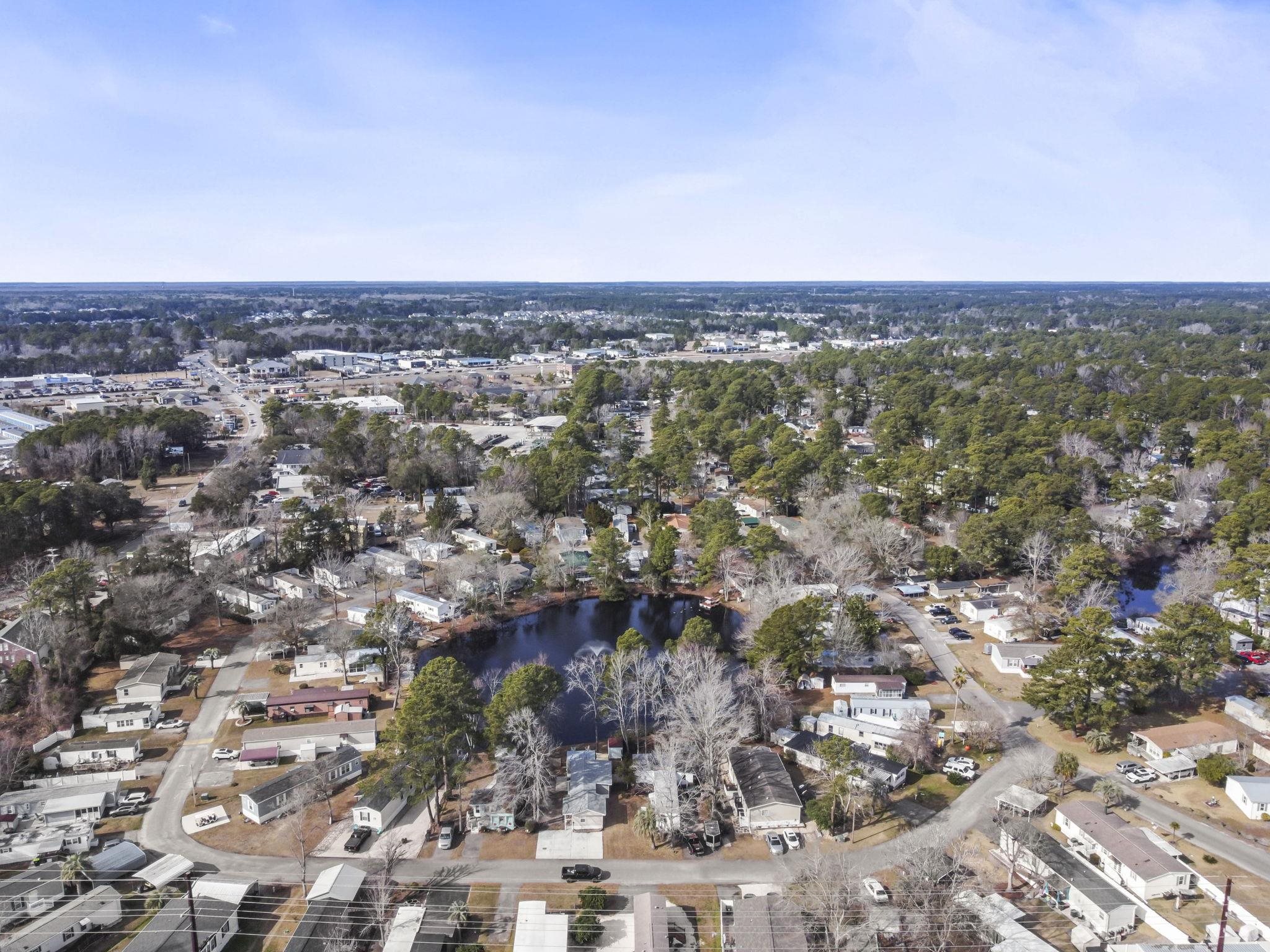 45 Shamrock Circle Murrells Inlet, SC 29576 - Photo 8 of 32 Aerial view of property's location featuring a nearby body of water and nearby suburban area