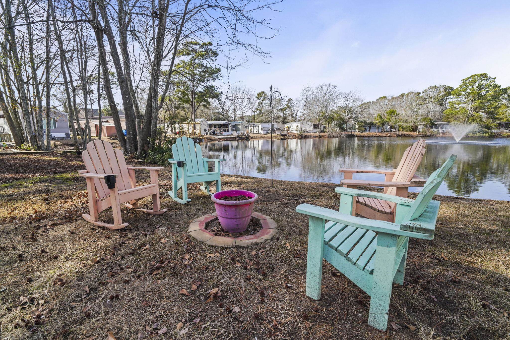 45 Shamrock Circle Murrells Inlet, SC 29576 - Photo 10 of 32 View of yard with a water view
