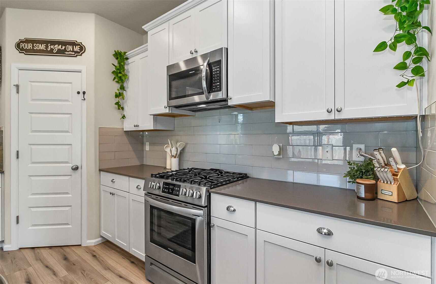 907 Bryant Road Sultan, WA 98294 - Photo 13 of 40 a kitchen with stainless steel appliances white cabinets and a stove