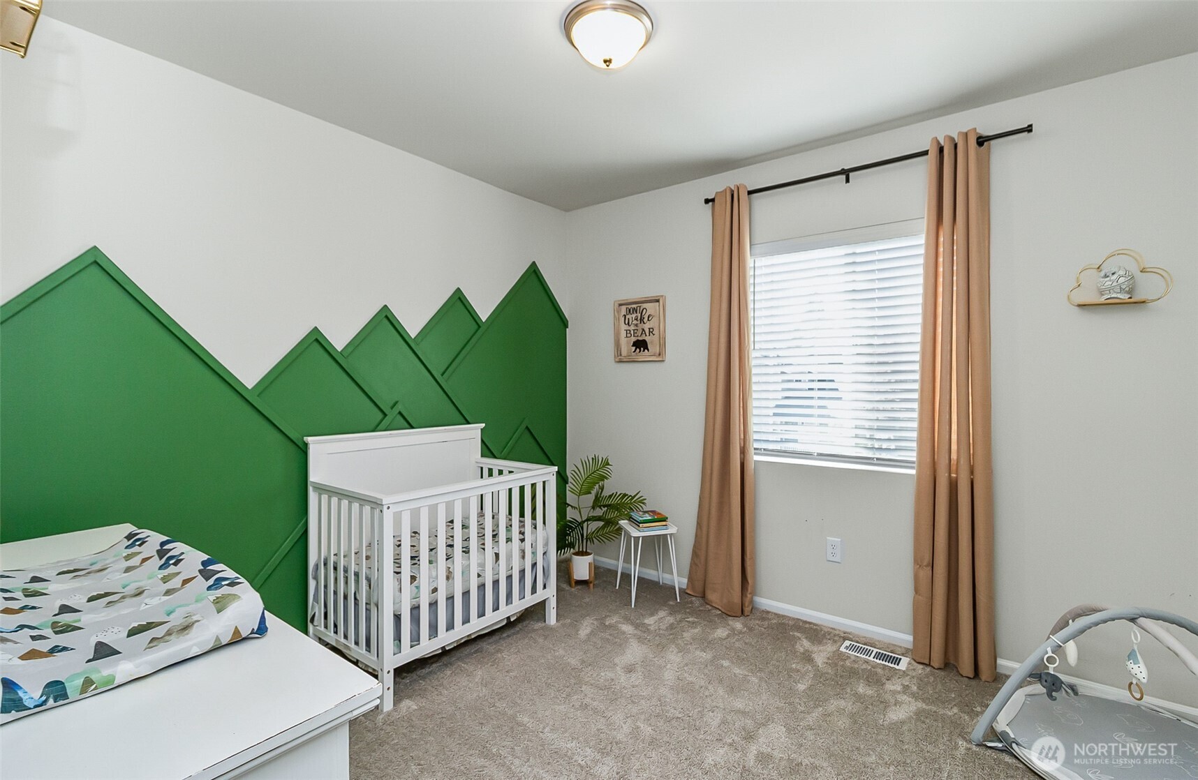 907 Bryant Road Sultan, WA 98294 - Photo 18 of 40 a bedroom with a bed and a window