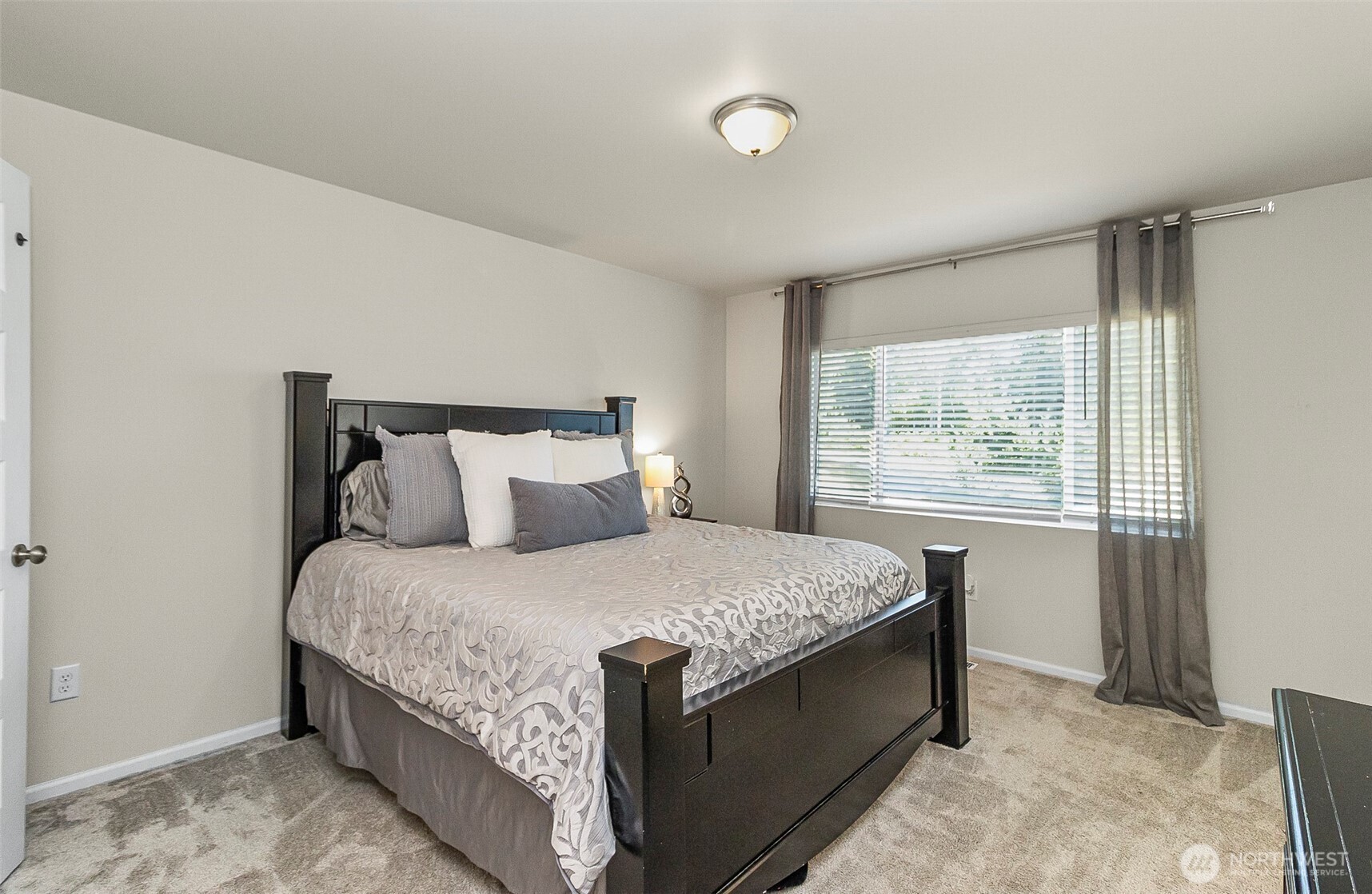 907 Bryant Road Sultan, WA 98294 - Photo 25 of 40 a bedroom with a bed and window