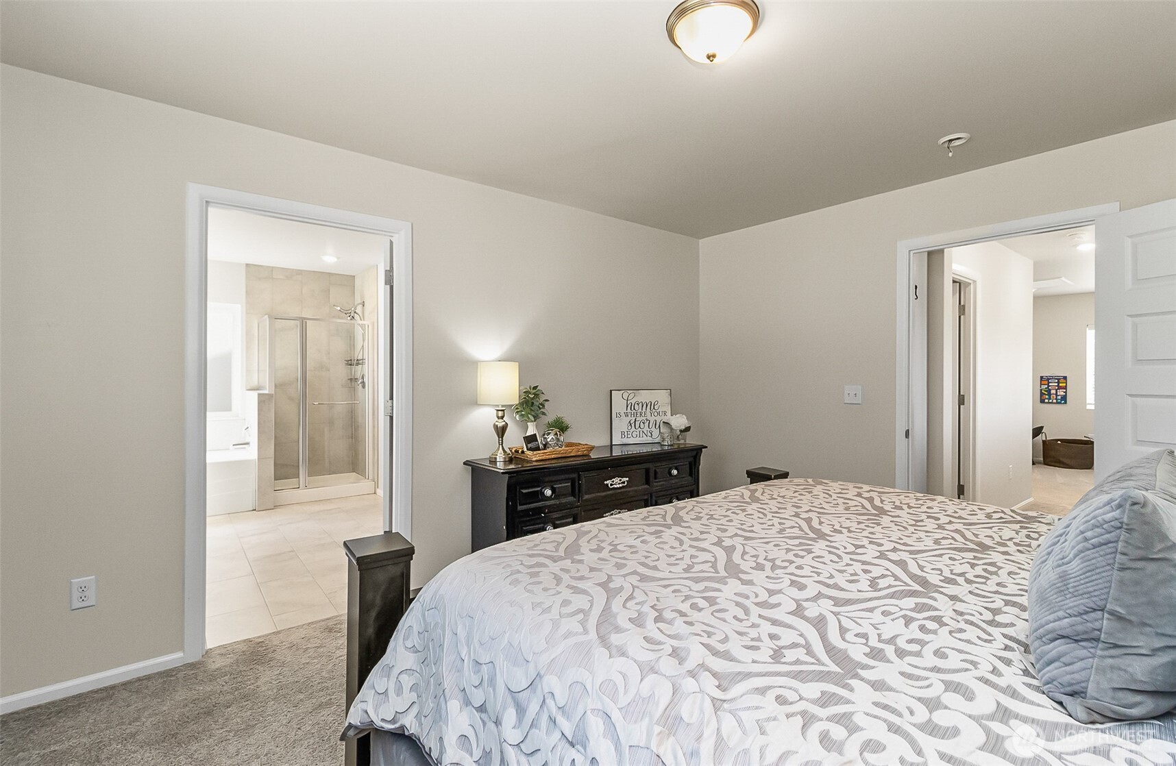 907 Bryant Road Sultan, WA 98294 - Photo 26 of 40 a bedroom with a bed and a lamp