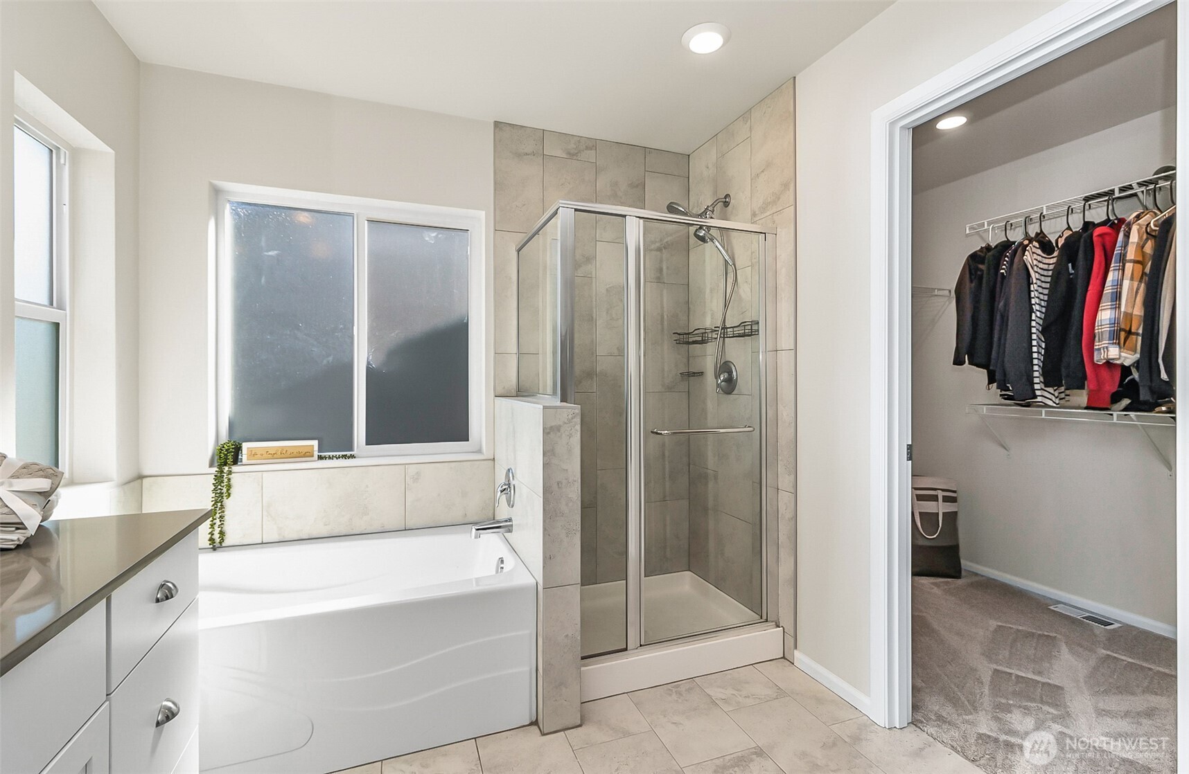 907 Bryant Road Sultan, WA 98294 - Photo 28 of 40 a bathroom with a tub shower and sink