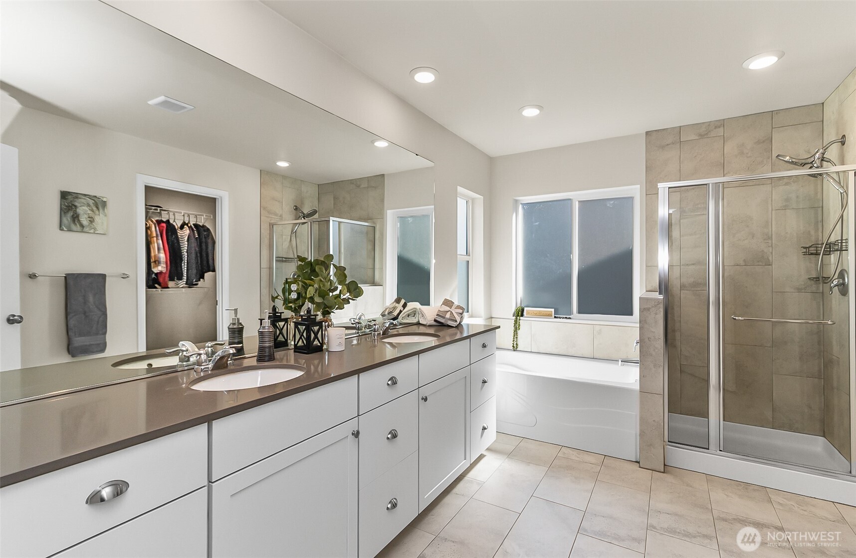 907 Bryant Road Sultan, WA 98294 - Photo 29 of 40 a bathroom with a double vanity sink mirror and shower