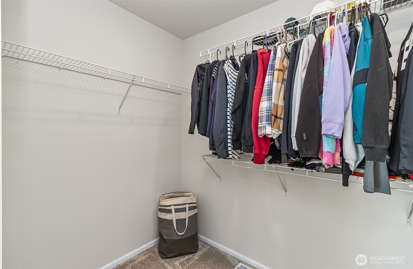 907 Bryant Road Sultan, WA 98294 - Photo 30 of 40 a view of walk in closet with clothes