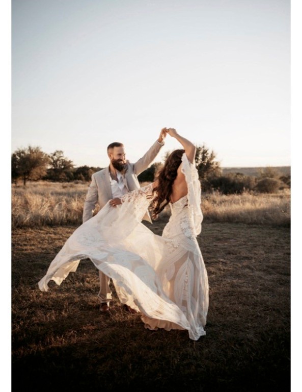 997 Big Sandy Road Johnson City, TX 78636 - Photo 17 of 33 a bed with white sheets and pillows on it