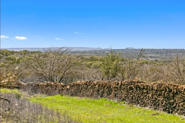 a view of outdoor space with swimming pool and mountains