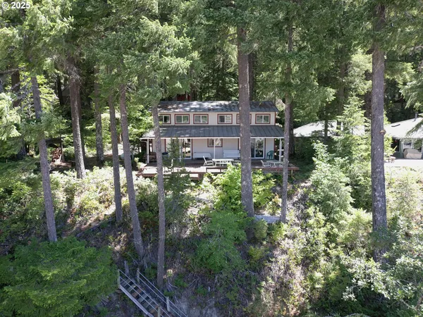 a picture of a room with furniture window and outside view