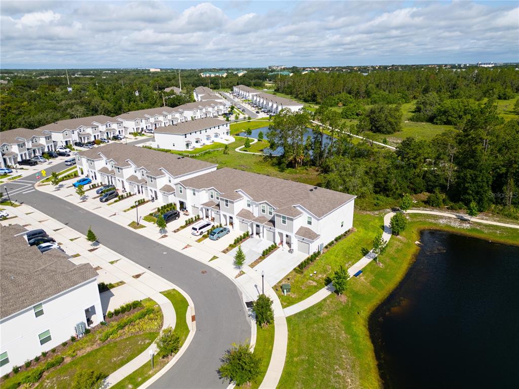 2340 Brook Marsh Loop Kissimmee, FL 34747 - Photo 11 of 53 an aerial view of a house with a swimming pool