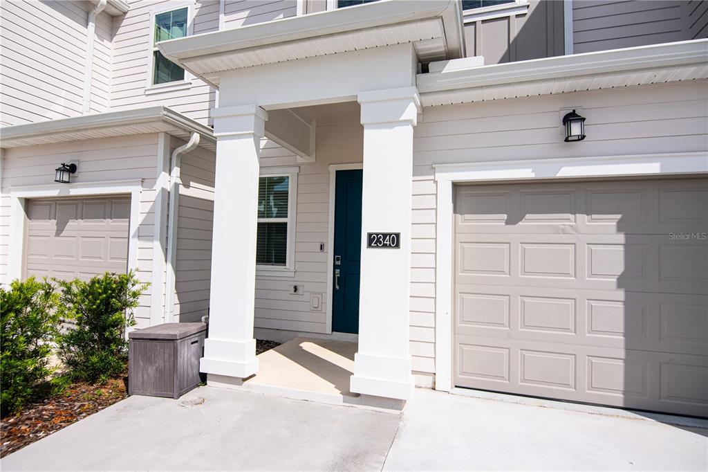 2340 Brook Marsh Loop Kissimmee, FL 34747 - Photo 17 of 53 front view of a house with a white door