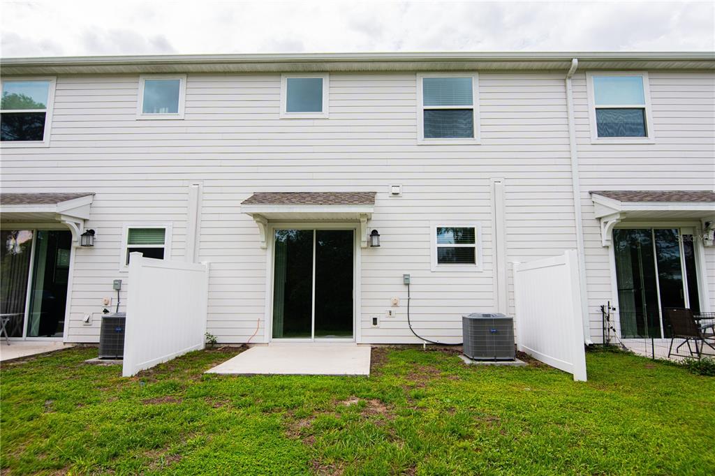 2340 Brook Marsh Loop Kissimmee, FL 34747 - Photo 34 of 53 a view of a house with a yard