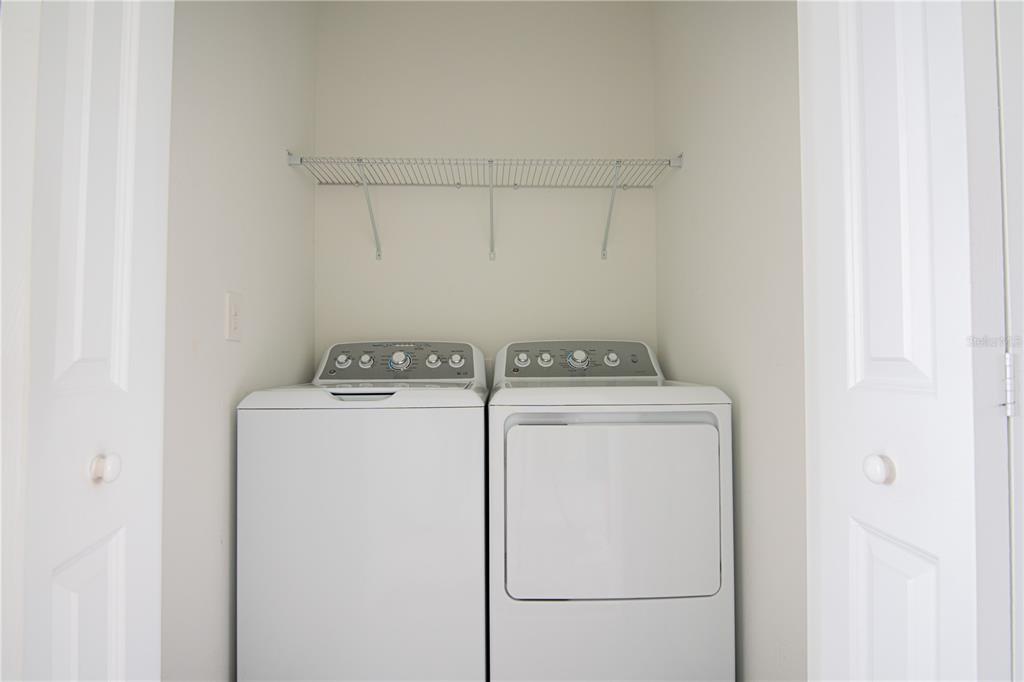 2340 Brook Marsh Loop Kissimmee, FL 34747 - Photo 38 of 53 a utility room with dryer and washer