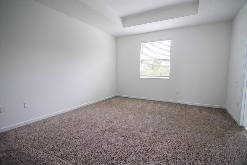 2340 Brook Marsh Loop Kissimmee, FL 34747 - Photo 45 of 53 an empty room with a window