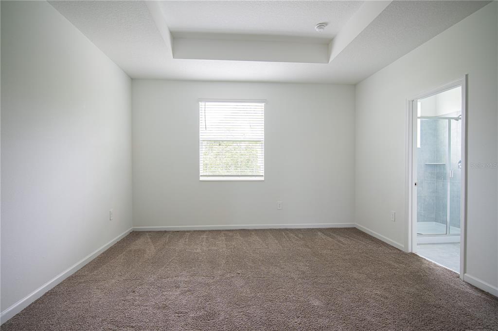 2340 Brook Marsh Loop Kissimmee, FL 34747 - Photo 46 of 53 an empty room with a window