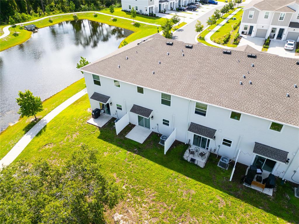 2340 Brook Marsh Loop Kissimmee, FL 34747 - Photo 7 of 53 an aerial view of a house with a swimming pool