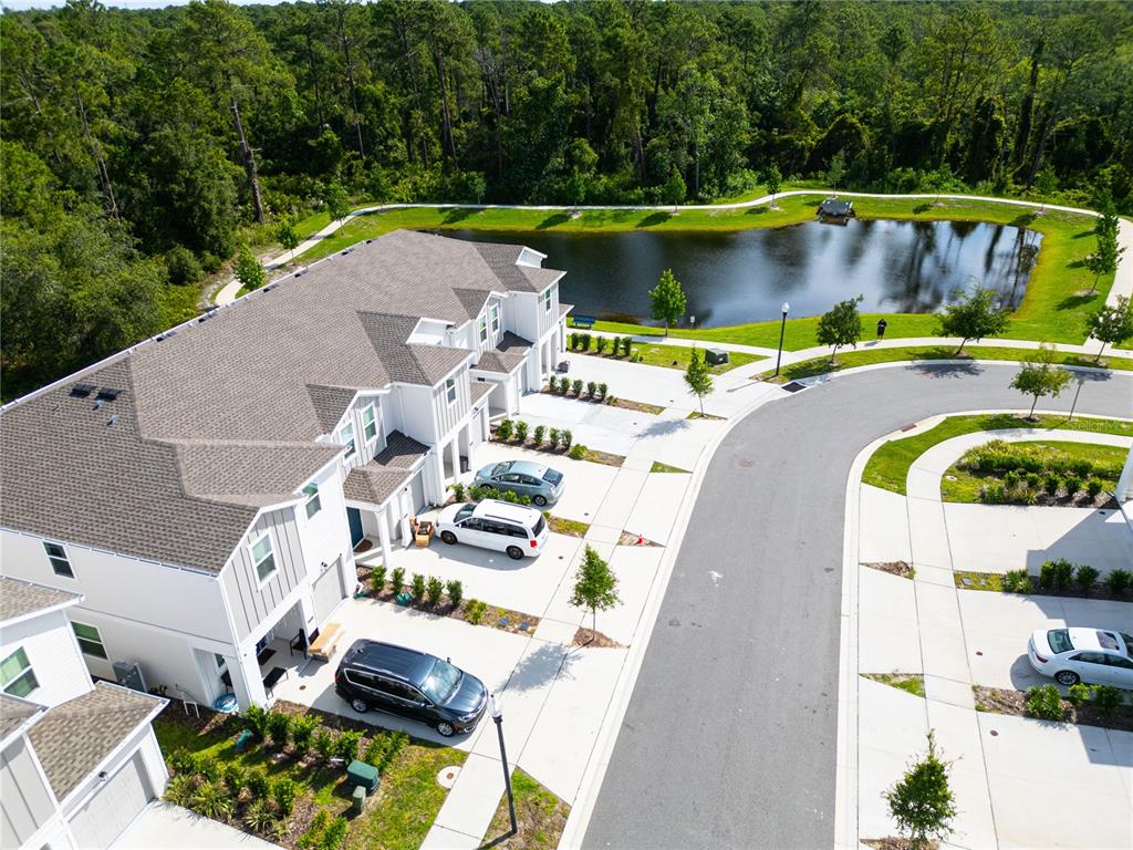 2340 Brook Marsh Loop Kissimmee, FL 34747 - Photo 9 of 53 an aerial view of a house with a swimming pool patio and outdoor seating