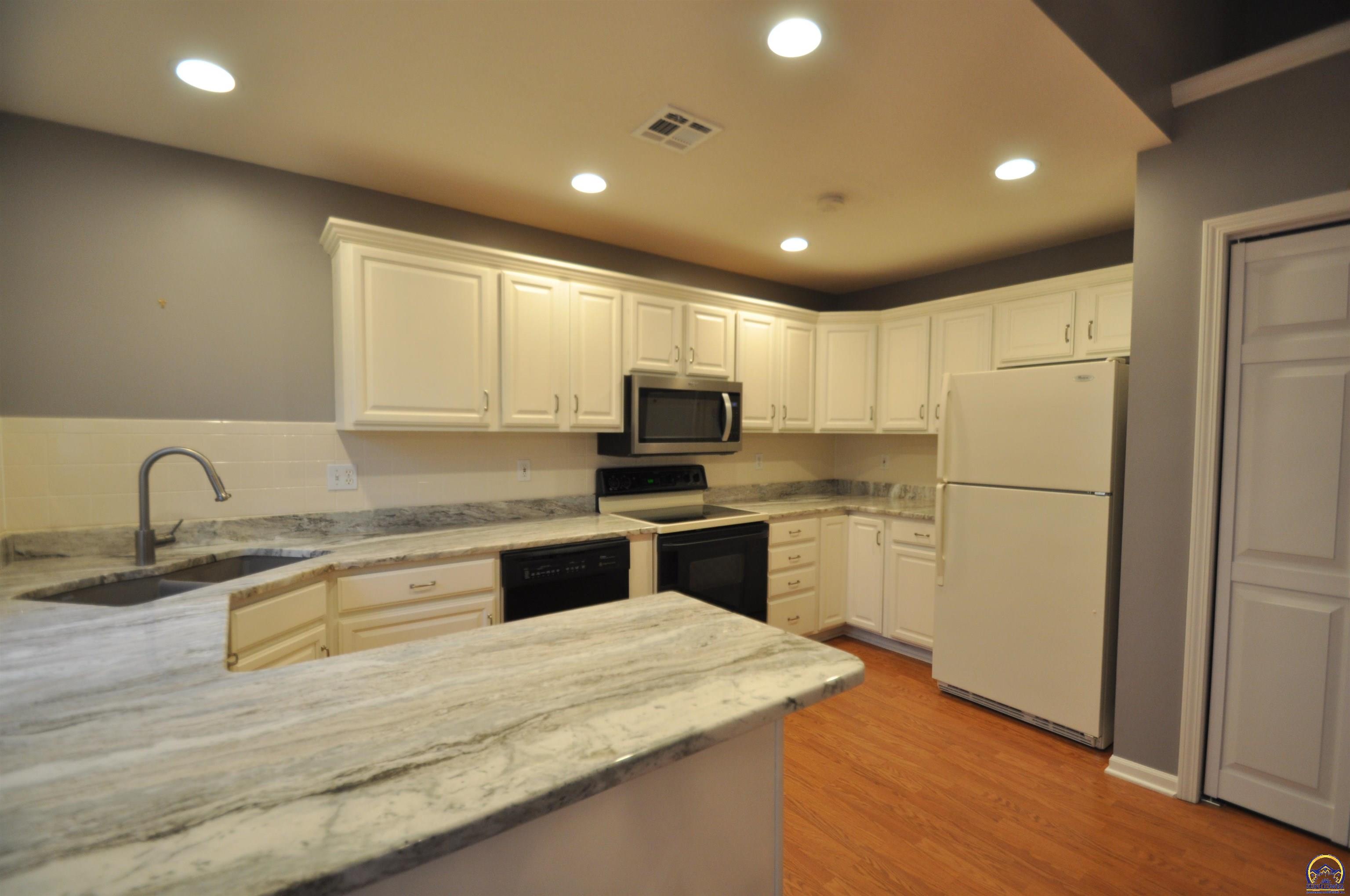 5822 Southwest Sterling Lane Topeka, KS 66604 - Photo 16 of 51 updated kitchen