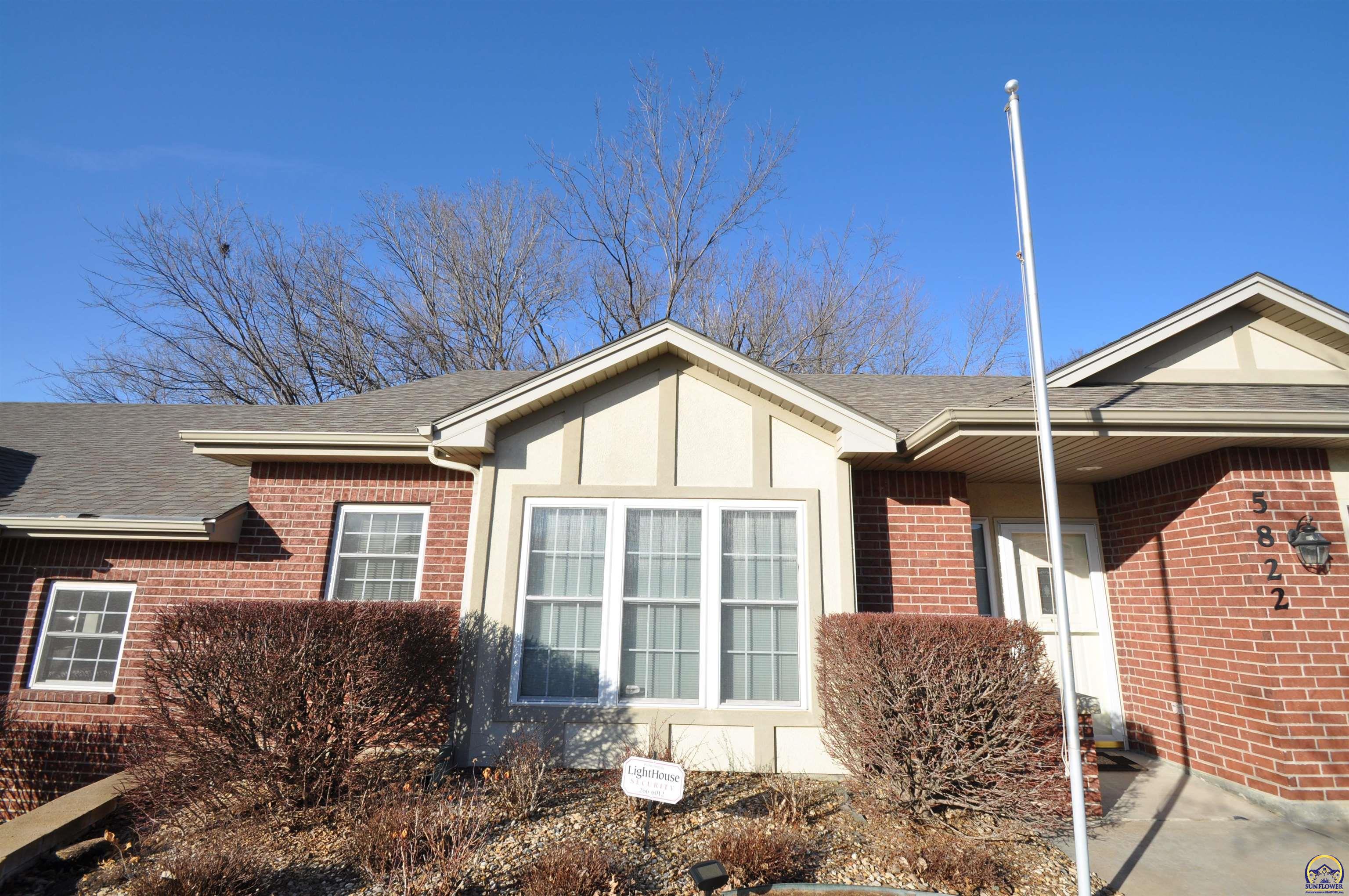 5822 Southwest Sterling Lane Topeka, KS 66604 - Photo 4 of 51 front landscaping