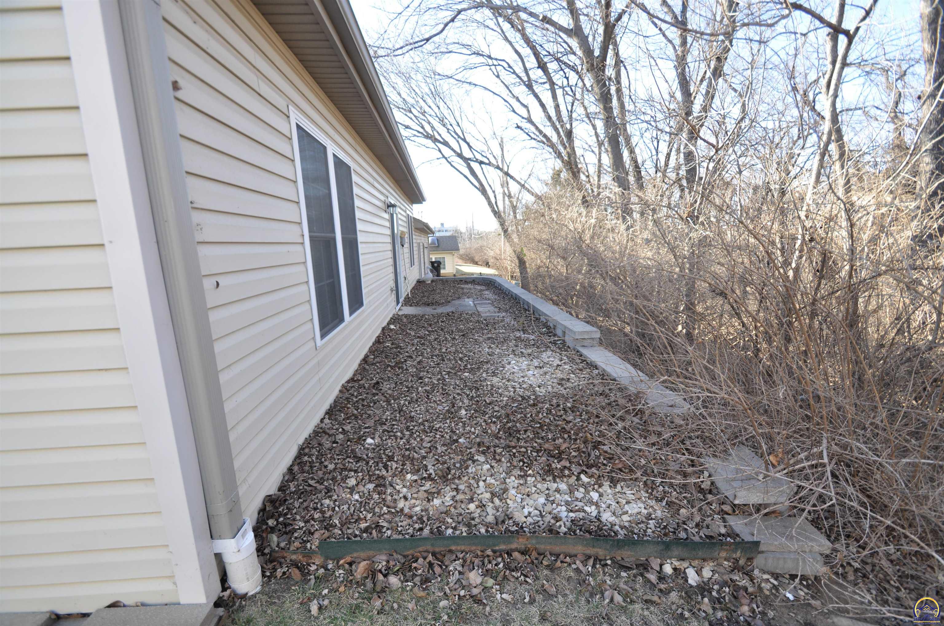 5822 Southwest Sterling Lane Topeka, KS 66604 - Photo 41 of 51 rear view