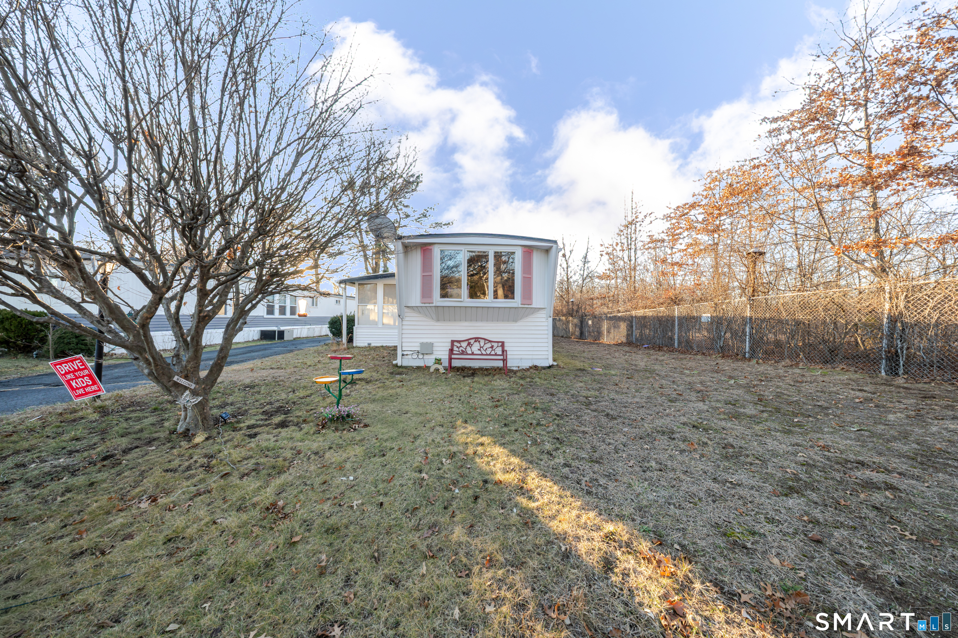 93 Shawnee Road East Hartford, CT 06118 - Photo 37 of 37 a view of a house with a yard