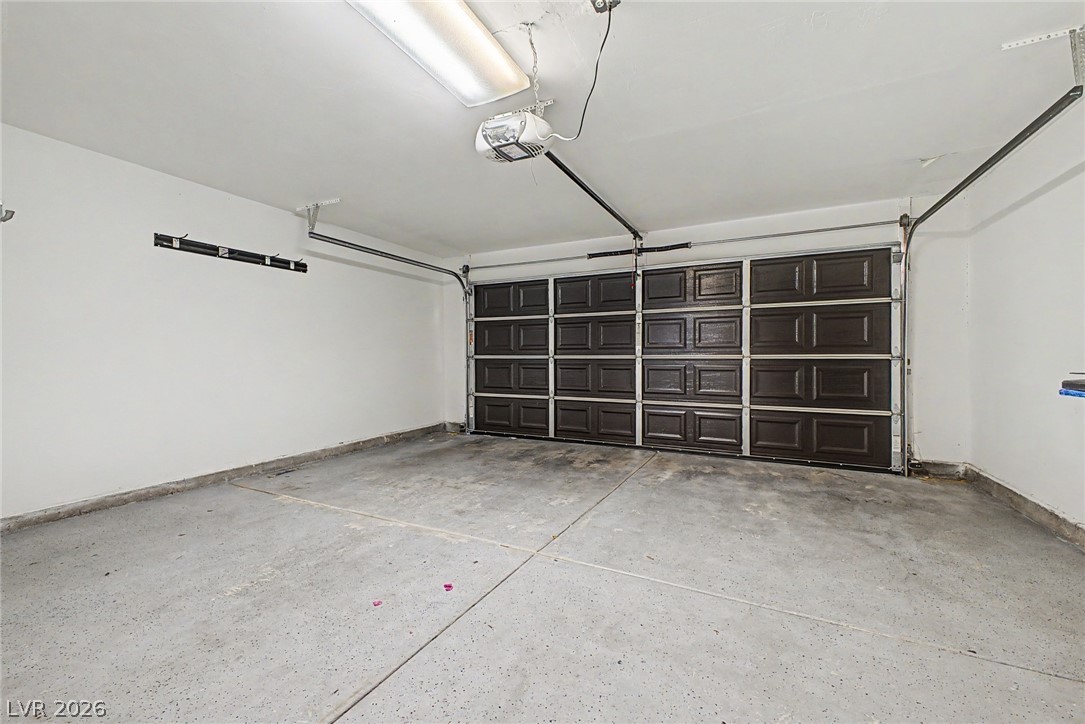 2316 Ramsgate Drive Henderson, NV 89074 - Photo 24 of 28 A spacious, well-lit garage with a durable concrete floor and an automatic door opener.