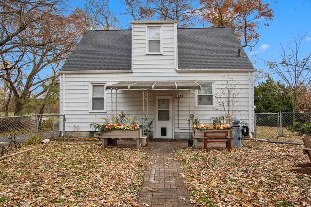 a backyard of a house with seating space
