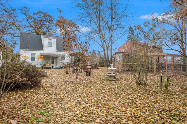 a view of roof covered with trees