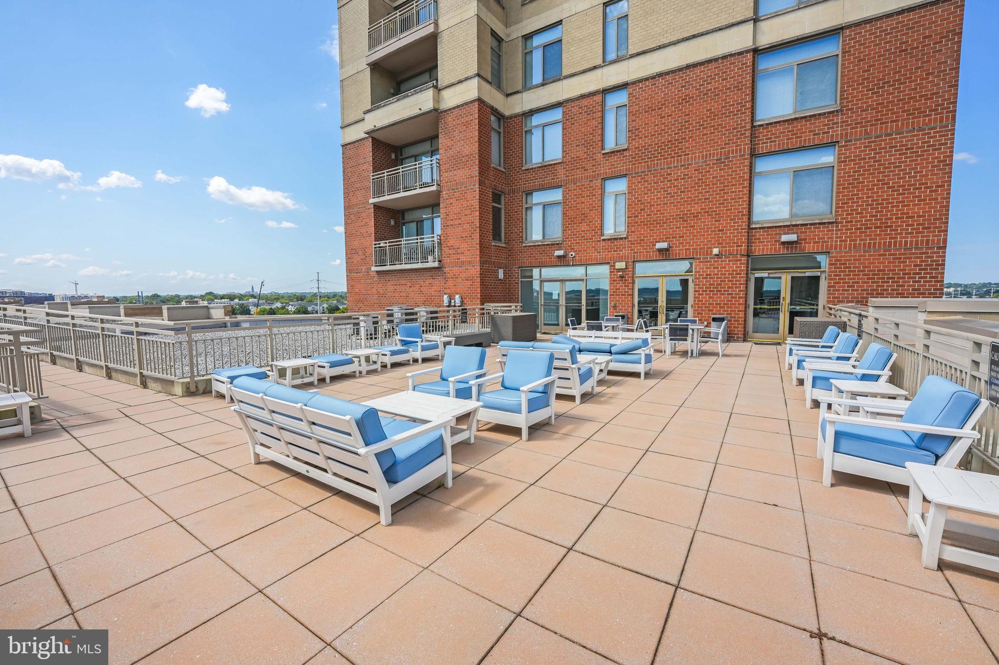 3650 South Glebe Road, Unit 1145 Arlington, VA 22202 - Photo 29 of 42 a view of terrace with seating space and building view