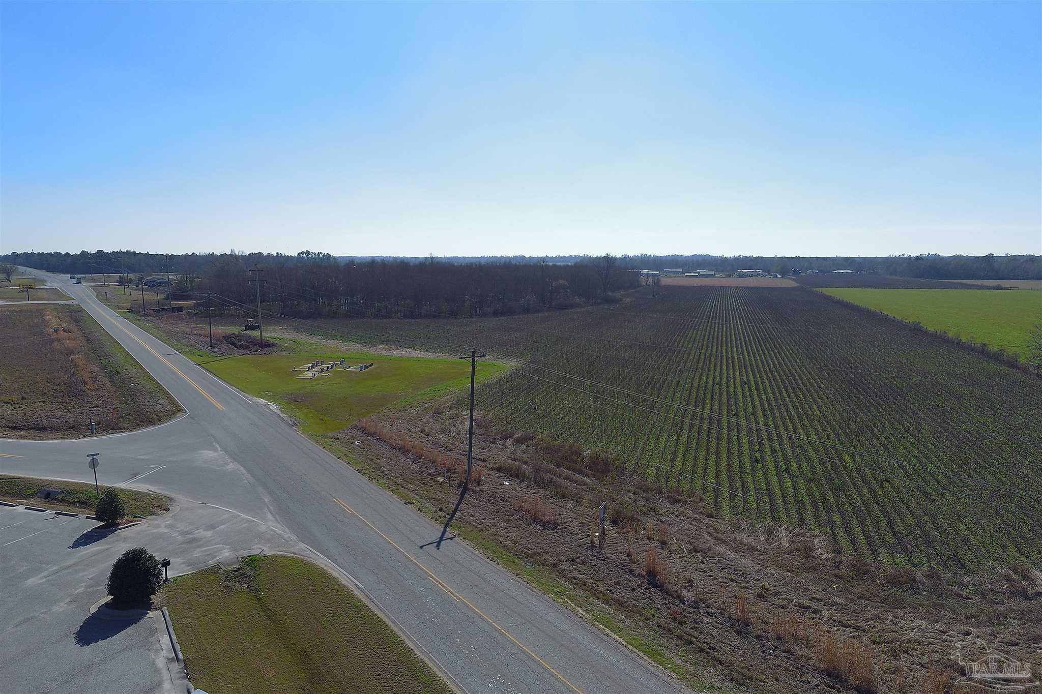 2 Jack Springs Road Atmore, AL 36502 - Photo 14 of 27 a view of a lake with a mountain
