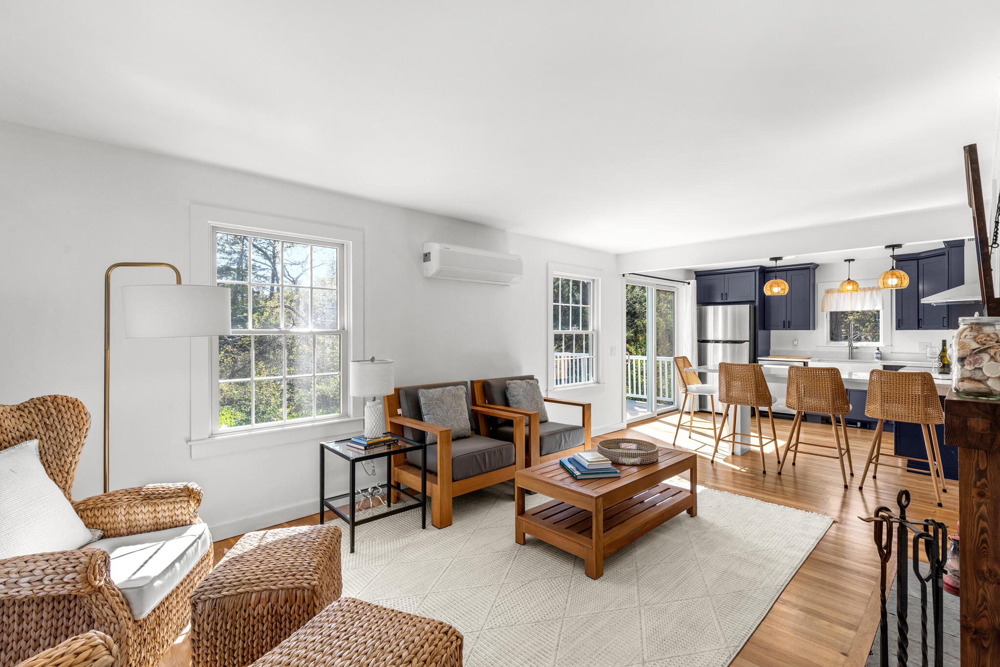1295 Massasoit Road Eastham, MA 02642 - Photo 8 of 32 a living room with furniture and a window
