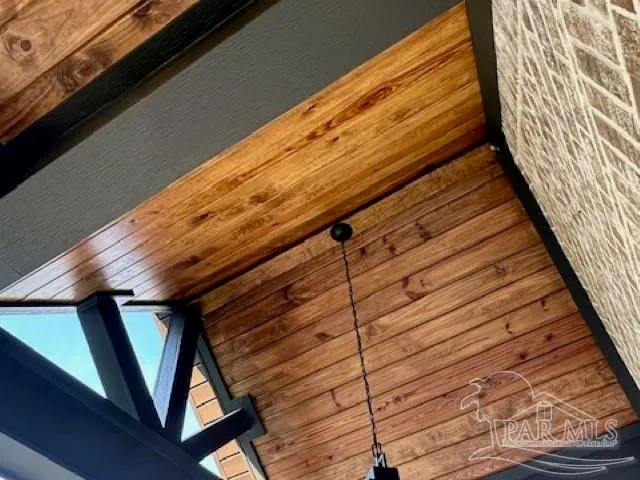 a view of outdoor space with wooden floor and stairs