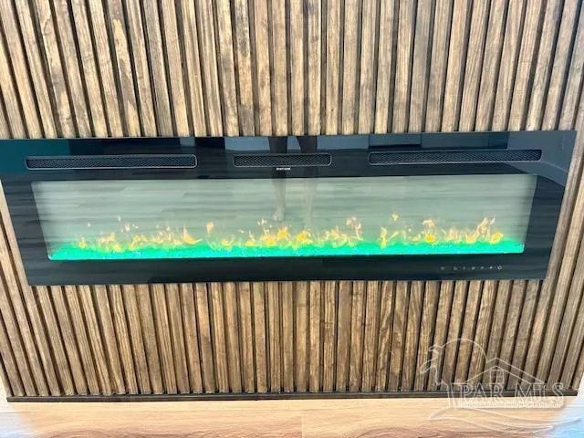 a kitchen with stainless steel appliances granite countertop a sink and a stove