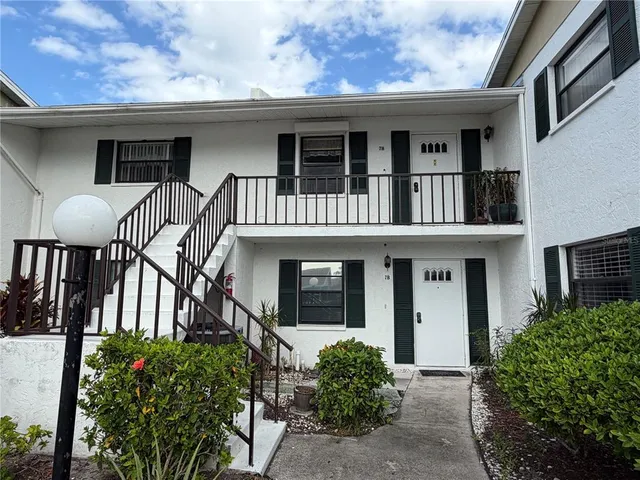a front view of a house with porch