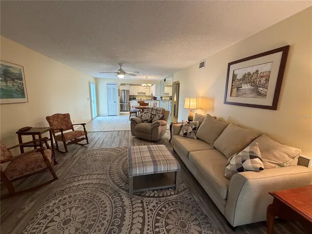 a living room with furniture and a couch