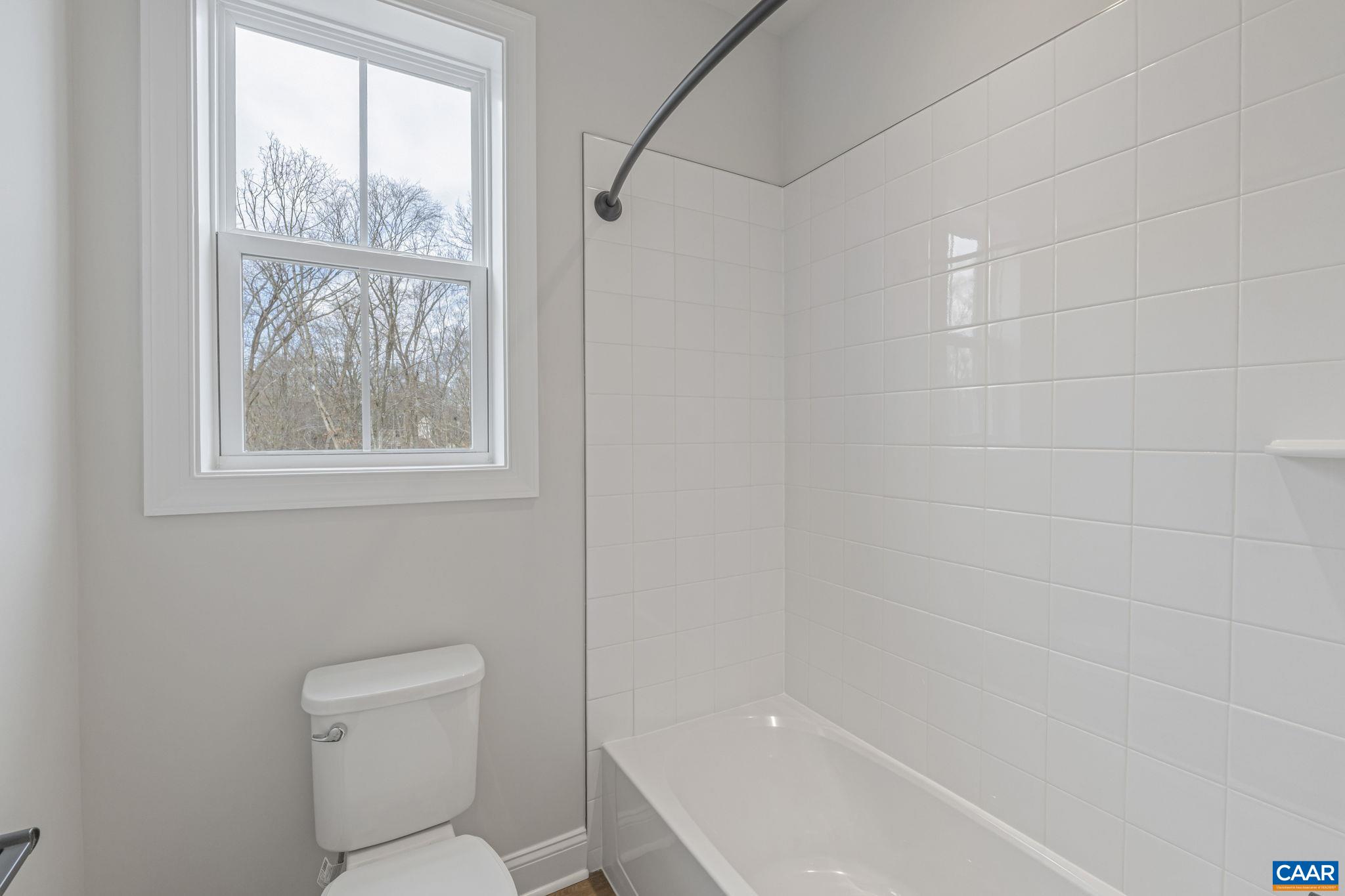 62 A Springdale Road Waynesboro, VA 22980 - Photo 25 of 37 a bathroom with a toilet and a shower
