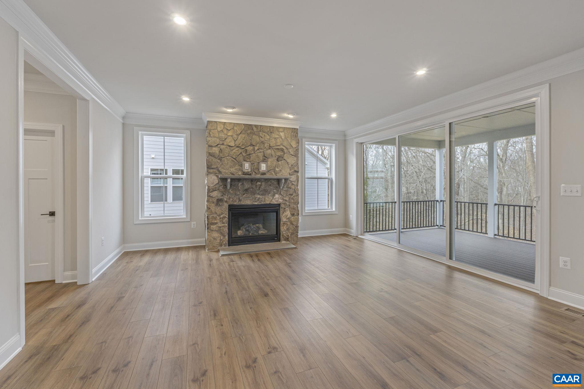 62 A Springdale Road Waynesboro, VA 22980 - Photo 8 of 37 a view of empty room with wooden floor and fireplace