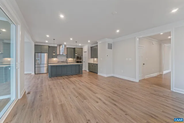 a view of kitchen with wooden floor
