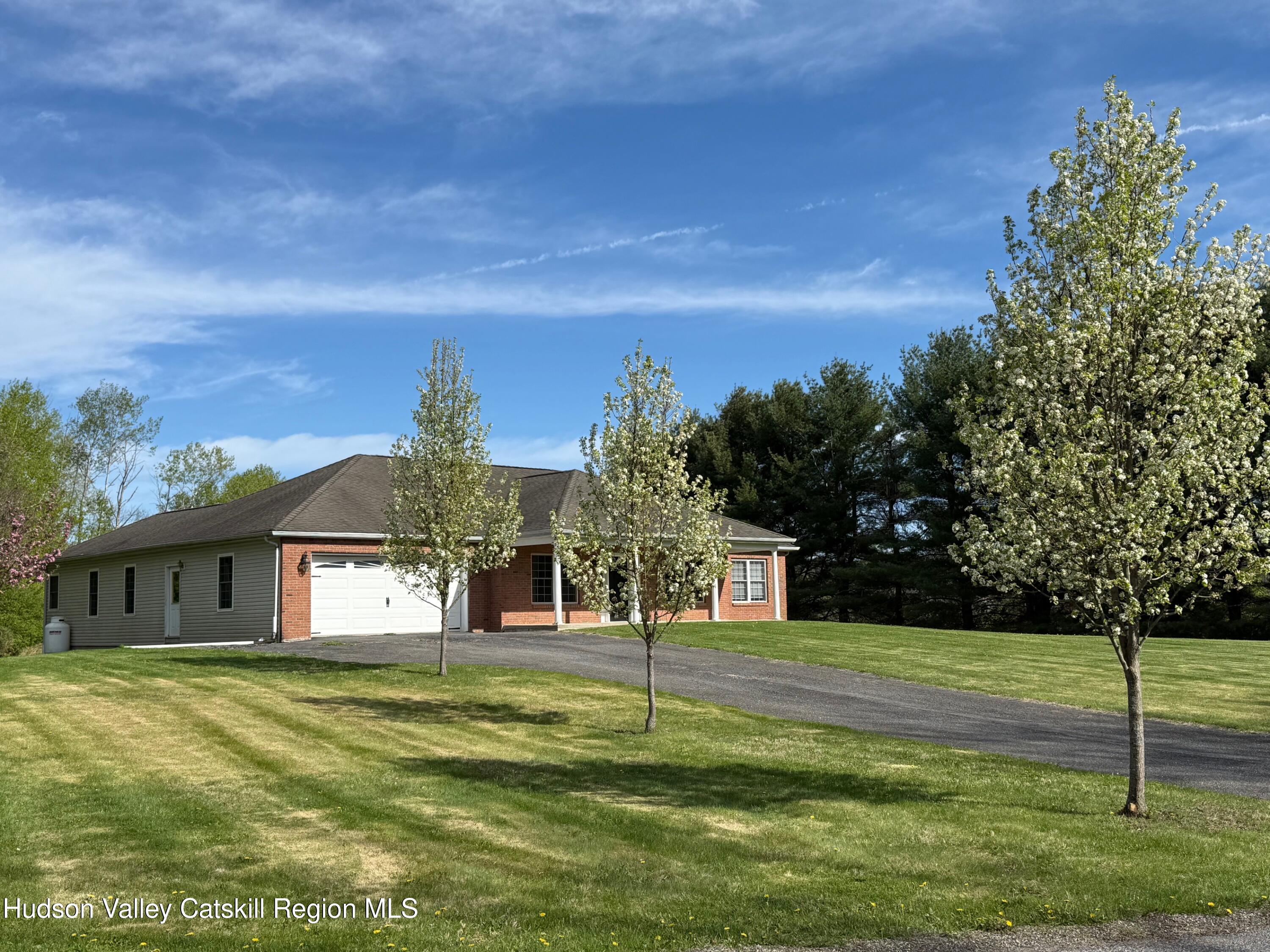 24 Mountain View Road Amenia, NY 12501 - Photo 2 of 13 a house view with a garden space
